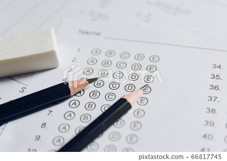 Pencil and eraser on answer sheets or Standardized Pencil and eraser on answer sheets or Standardized 66817745