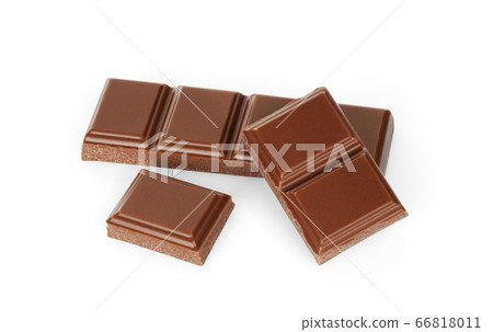 Dark chocolate pieces isolated on white background Dark chocolate pieces isolated on white background 66818011
