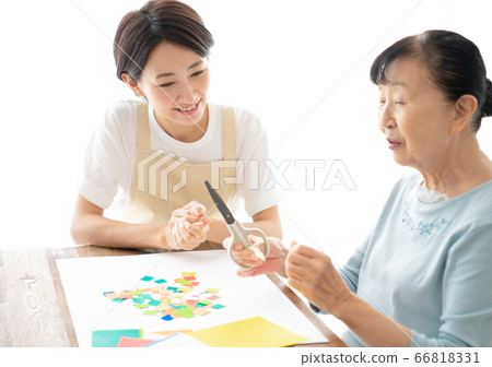 Rehabilitation origami of senior woman Rehabilitation origami of senior woman 66818331