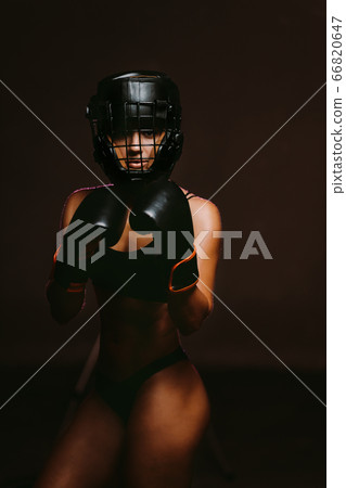 sexy woman boxer mma ufc fighter in boxing gloves 66820647