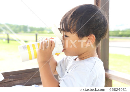 Hydration A child drinking a drink from a water bottle Hydration A child drinking a drink from a water bottle 66824981
