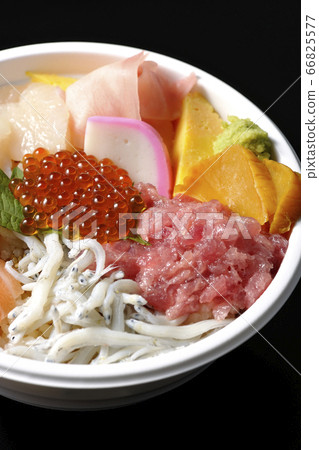Colorful seafood bowl with salmon, shirasu, salmon roe, scallops and tuna (black background) 66825577