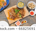 Grilled squid and seafood sauce. 66825691
