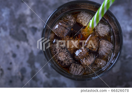 A cool drink with ice. 66826078