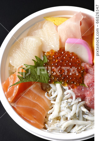 Colorful seafood bowl with salmon, shirasu, salmon roe, scallop and tuna (black background, bird's eye view) 66826347
