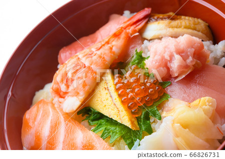 Bowl of rice topped with sashimi Bowl of rice topped with sashimi 66826731