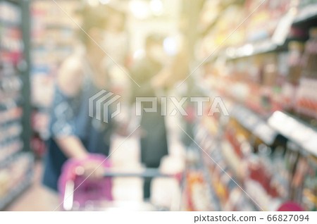 woman looking products at shopping store. woman looking products at shopping store. 66827094