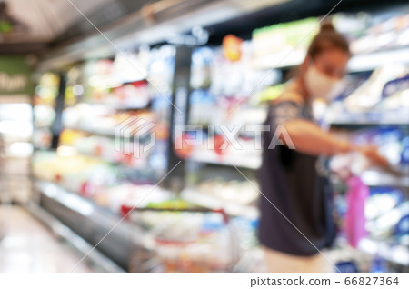 Blur Asian woman shopping products in the Mall. Blur Asian woman shopping products in the Mall. 66827364