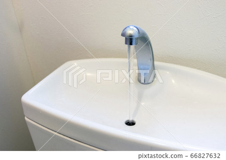 Flush toilet tank and faucet 66827632