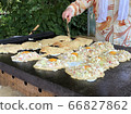 Summer festival okonomiyaki where you wear a stylish happi and bake 66827862