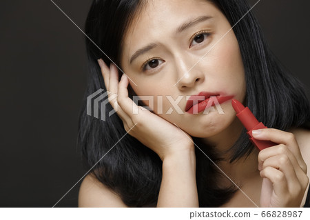 Woman beauty portrait on black background Woman beauty portrait on black background 66828987