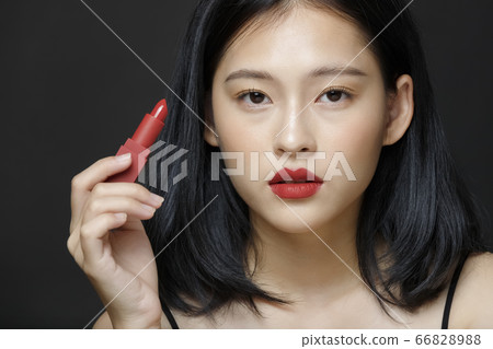 Woman beauty portrait on black background Woman beauty portrait on black background 66828988
