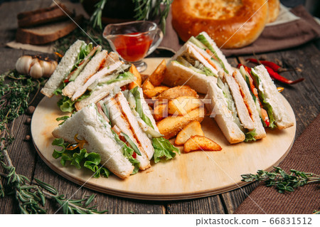 Sandwiches set with red sauce rustic potato wedges 66831512