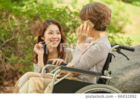 Mother and daughter walking Mother and daughter walking 66832892