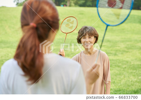 Mother and daughter exercising Mother and daughter exercising 66833700