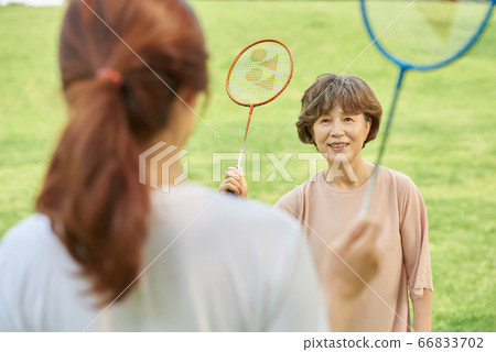Mother and daughter exercising Mother and daughter exercising 66833702