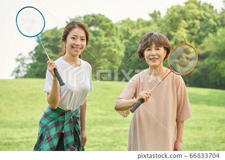Mother and daughter exercising Mother and daughter exercising 66833704