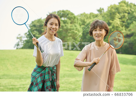 Mother and daughter exercising Mother and daughter exercising 66833706