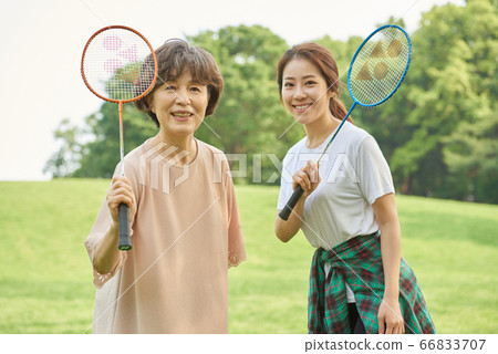 Mother and daughter exercising Mother and daughter exercising 66833707