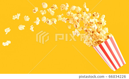 popcorn in classic bucket red and white splashing out of the box 66834226