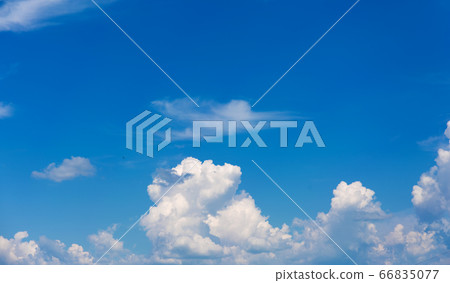 White clouds on blue sky background. 66835077