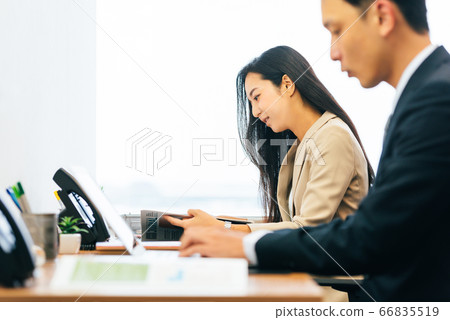 Business men and women 66835519