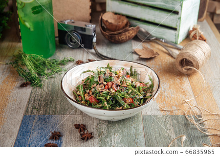 Tuna salad with arugula in balsamic dressing  66835965