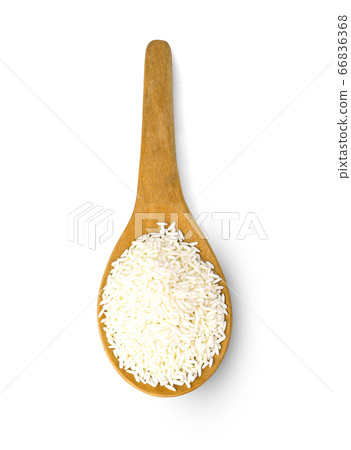 Top view of glutinous rice in a wooden spoon. Top view of glutinous rice in a wooden spoon. 66836368