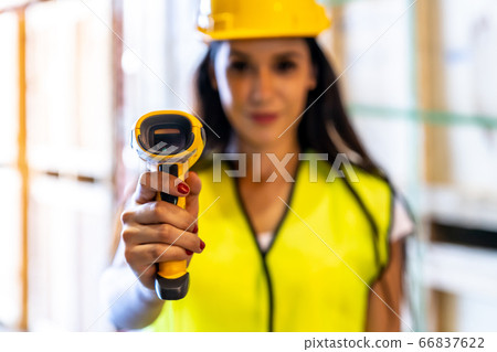 Warehouse worker hold inventory scanner. 66837622