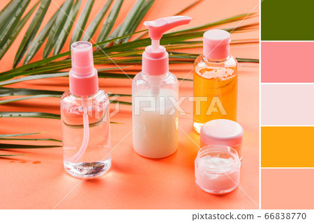 Generic beauty products on orange. Color swatch 66838770