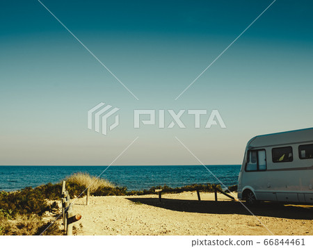 Camper car on beach, camping on nature 66844461