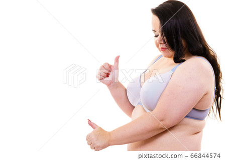 Big woman in bra, body positive. Big woman in bra, body positive. 66844574