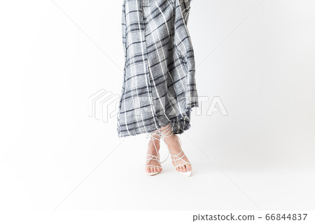 Women's feet wearing sandals 66844837