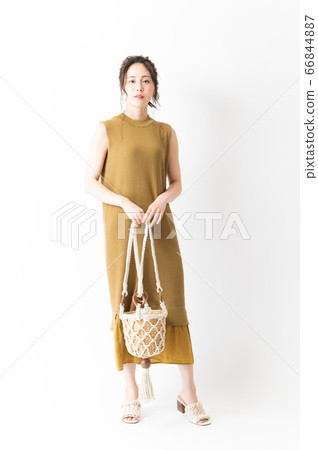 One piece woman with shoulder bag 66844887
