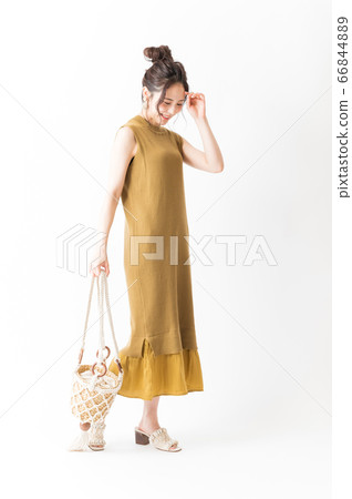 One piece woman with shoulder bag 66844889