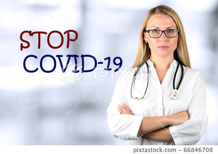 Image of a serious doctor  looking at camera. STOP COVID 19 66846708