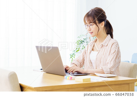 Woman with glasses during telework Woman with glasses during telework 66847038