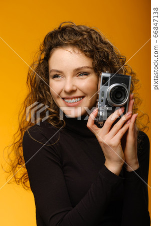 Beautiful girl with dental braces isolated on Beautiful girl with dental braces isolated on 66847138