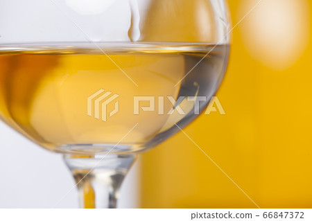glasses and bottles with orange wine glasses and bottles with orange wine 66847372