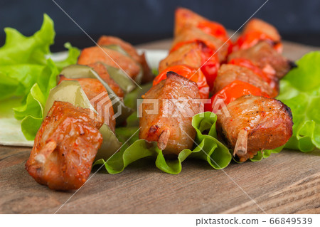 Barbecue pork on skewers with vegetables Barbecue pork on skewers with vegetables 66849539