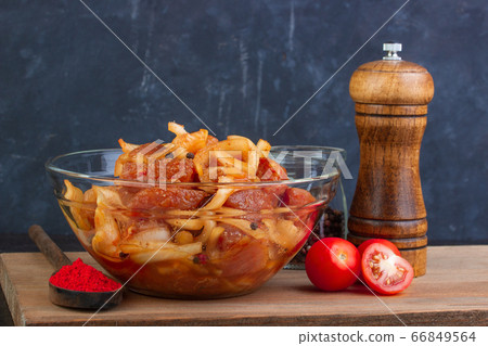 Marinated pork with saffron, pepper and soy sauce Marinated pork with saffron, pepper and soy sauce 66849564