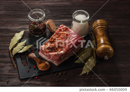 Salted dried bacon with spices and bay leaf and Salted dried bacon with spices and bay leaf and 66850009