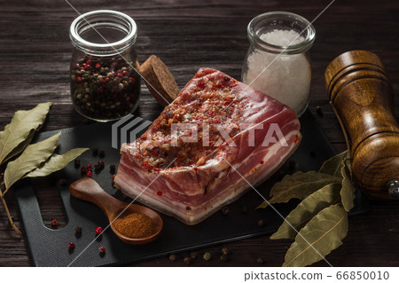 Salted dried bacon with spices and bay leaf and Salted dried bacon with spices and bay leaf and 66850010
