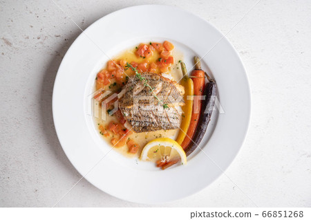 sea bass poele with white wine sauce, luxury 66851268