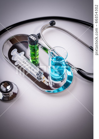 [Poor image of syringe and vaccine development] 66854302