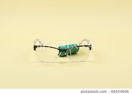 Glasses accessory a man with poor eyesight. Minimalism. Glasses accessory a man with poor eyesight. Minimalism. 66854696