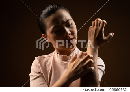 Asian woman was sick with irritate itching her Asian woman was sick with irritate itching her 66860782
