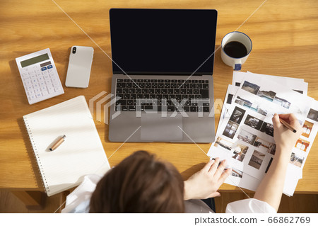 Woman doing work at home 66862769