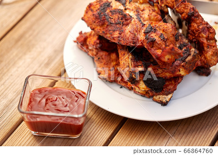grilled barbecue meat stack on plate grilled barbecue meat stack on plate 66864760