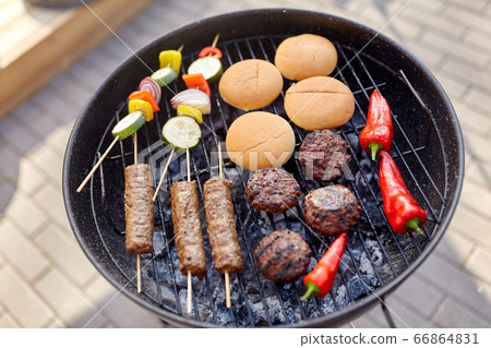 barbecue kebab meat and vegetables on grill barbecue kebab meat and vegetables on grill 66864831